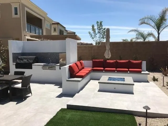 outdoor lounge area and outdoor kitchen