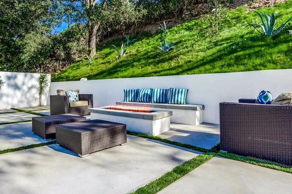 outdoor entertainment with stone benches